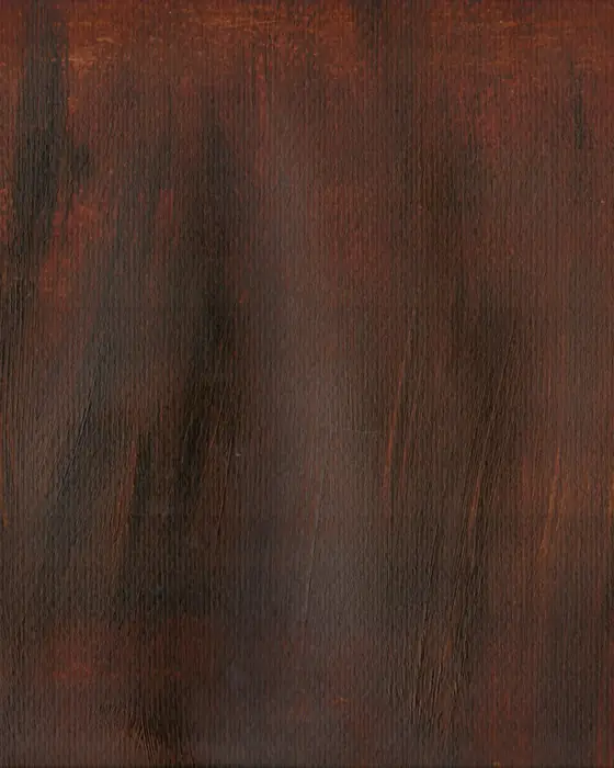Close-up of dark walnut boards with strong figure and warm brown tone.