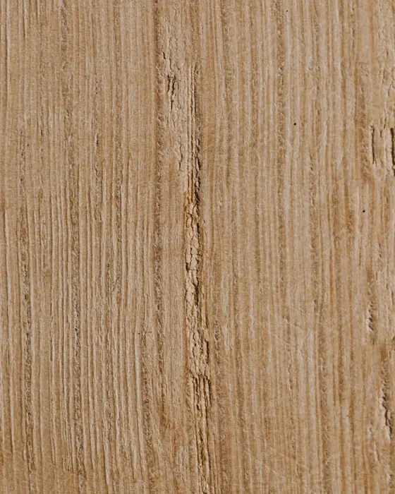 Close-up of pale white oak with straight, even grain running vertically.